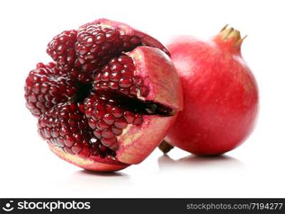 Delicious, exotic pomegranate fruit on white background