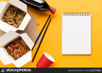 delicious fast food boxes with clipboard