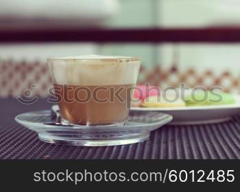 delicious flavored cappuccino and French macaroon