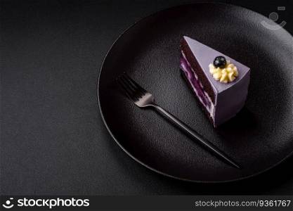 Delicious fresh blueberry or blackcurrant cake with cream cheese on a dark concrete background. Delicious fresh blueberry or blackcurrant cake with cream cheese