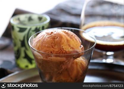 Delicious fresh caramel ice cream in a glass ready to serve.