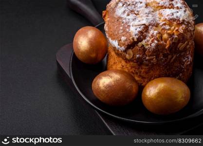 Delicious fresh Easter cake with fruits and raisins on a dark concrete background