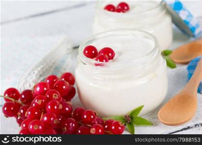 Delicious fresh homemade yogurt with red currant