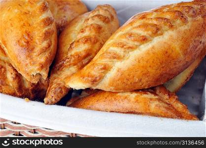 delicious fresh meat pies in basket