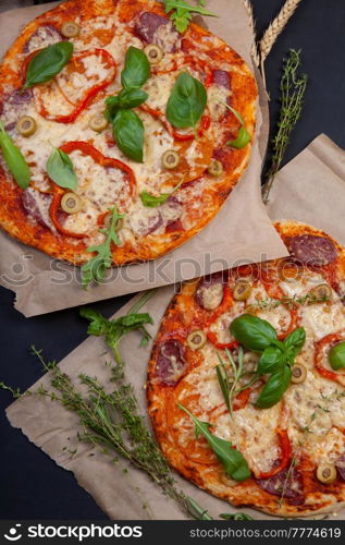 Delicious fresh pizza in dark