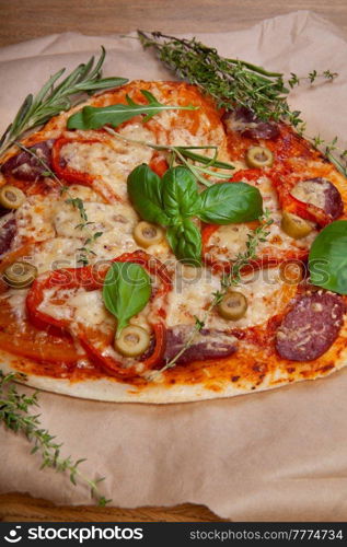 Delicious fresh pizza in dark