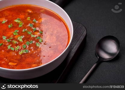 Delicious fresh Ukrainian borscht with beets, carrots and cabbage. Vegetarian dish