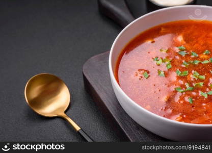 Delicious fresh Ukrainian borscht with beets, carrots and cabbage. Vegetarian dish