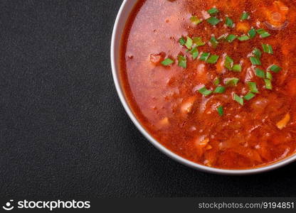 Delicious fresh Ukrainian borscht with beets, carrots and cabbage. Vegetarian dish