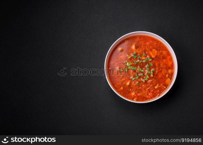 Delicious fresh Ukrainian borscht with beets, carrots and cabbage. Vegetarian dish