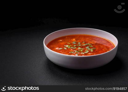 Delicious fresh Ukrainian borscht with beets, carrots and cabbage. Vegetarian dish