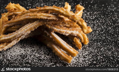 delicious fried churros with sugar high view. High resolution photo. delicious fried churros with sugar high view. High quality photo