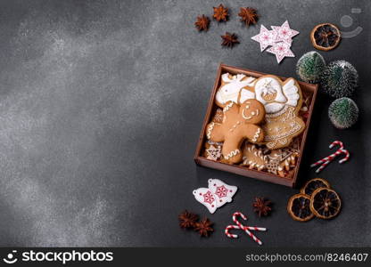 Delicious gingerbread cookies with honey, ginger and cinnamon. Winter composition. Delicious gingerbread cookies with honey, ginger and cinnamon