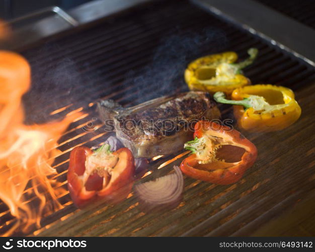 delicious grilled meat steak with vegetables on a barbecue. steak with vegetables on a barbecue