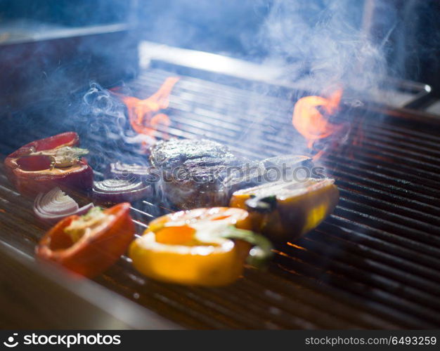 delicious grilled meat steak with vegetables on a barbecue. steak with vegetables on a barbecue