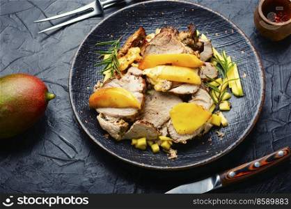 Delicious grilled meat with mango and cheese.. Fried pork with mango and cheese.