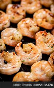 Delicious grilled shrimp. Macro background. High quality photo. Delicious grilled shrimp. Macro background.