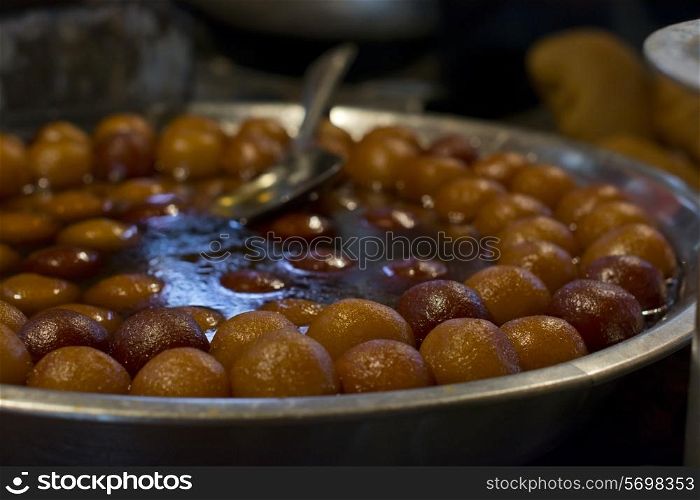 Delicious gulab jamun on display in stall