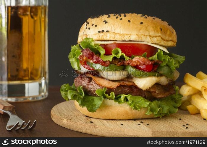 delicious hamburger with beer mug. High resolution photo. delicious hamburger with beer mug. High quality photo
