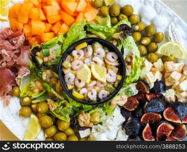 Delicious healthy salad on plate, with Olives