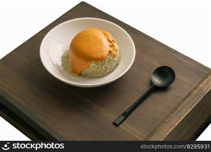 Delicious Homemade Oat Lava Cake with White Sesame in White Ceramic Plate erved with Spoon on the Wooden plank. Delicious Bakery Concept, Space for text, Selective Focus.