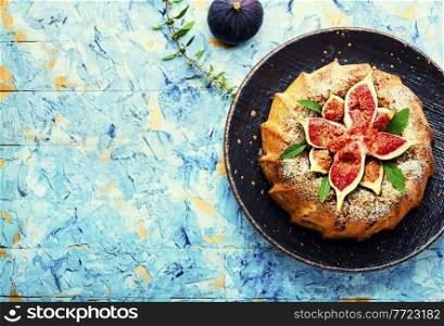 Delicious homemade pie with autumn figs.Sweet fall dessert.Copy space. Autumn pie with figs,space for text