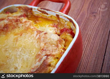 delicious homemade vegetable lasagna with tomato, paprika, onion and zucchini