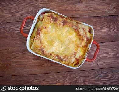 delicious homemade vegetable lasagna with tomato, paprika, onion and zucchini