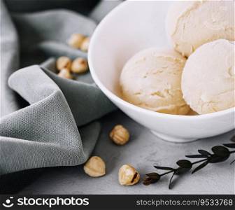 Delicious ice cream with hazelnut close up