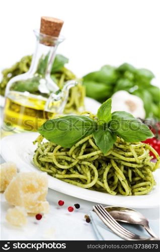 delicious italian pasta with pesto sauce over white