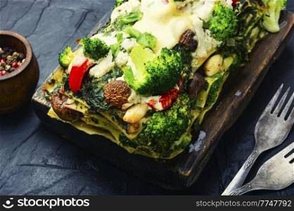 Delicious lasagne, broccoli, mushroom and pepper terrine. Festive food.. Diet vegetable terrine