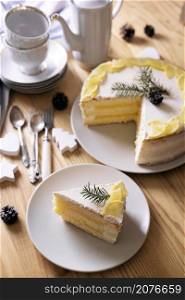 delicious lemon cake with a layer of lemon curd and cheese cream. still life. christmas dinner