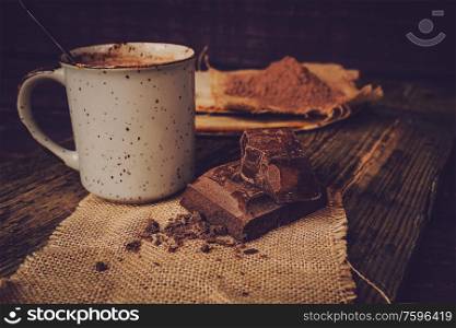 Delicious lifestyle of a warm chocolate cup and sweeties