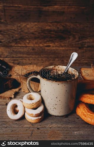 Delicious lifestyle of a warm chocolate cup and sweeties