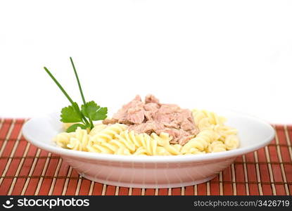 delicious macaroni pasta with tuna in a white plate