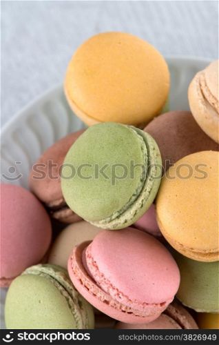Delicious Macarons, French Pastry Cookies with Cream.
