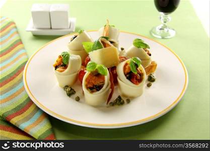 Delicious Mediterranaen style pasta tubes with with roasted tomato and proscuitto.