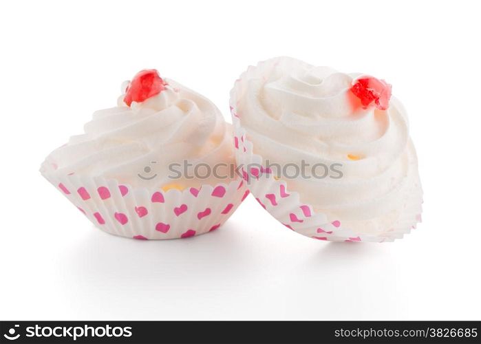 Delicious meringues, sugar candy on white background.