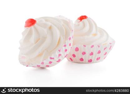 Delicious meringues, sugar candy on white background.