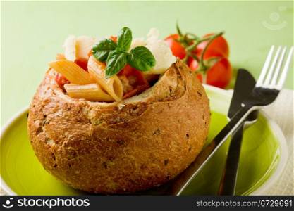 delicious multi grain bread stuffed with pasta on green plate
