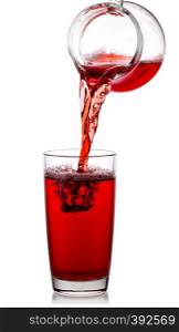 Delicious natural cherry juice poured into a transparent glass with a decanter isolated on a white background. Delicious natural cherry juice poured into transparent glass wit