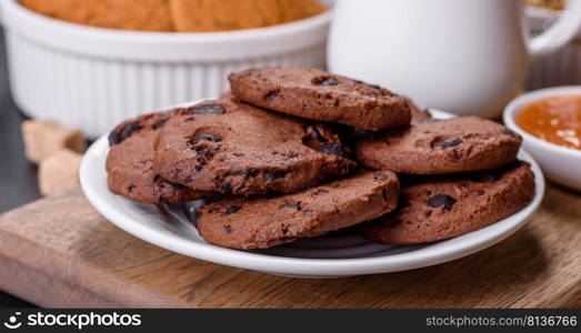 Delicious nutritious healthy breakfast with granola, eggs, oat cookies, milk and jam. Healthy eating at the beginning of the day. Delicious nutritious healthy breakfast with granola, eggs, oat cookies, milk and jam