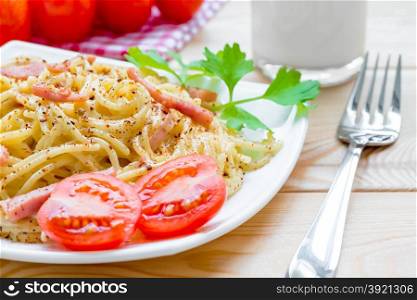 delicious pasta carbonara and beautiful table setting