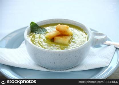 Delicious pea soup with fresh mint and ready to serve.