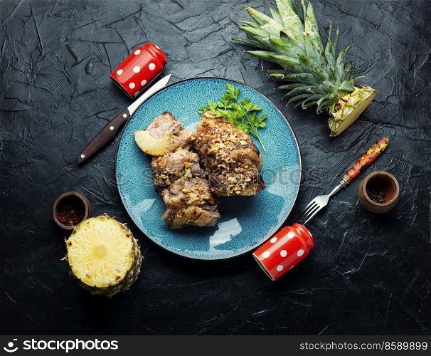 Delicious piece of pork roasted with cheese and pineapple. Pork baked with pineapple