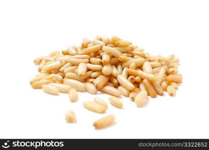 Delicious pine nuts isolated on white