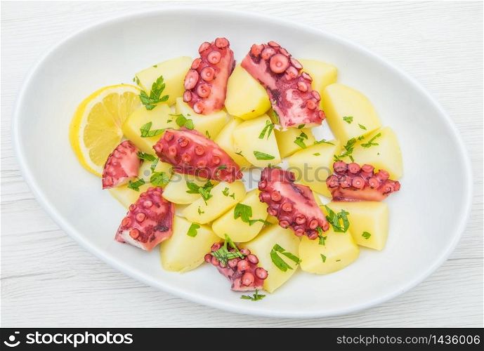 delicious plate of octopus salad with potatoes