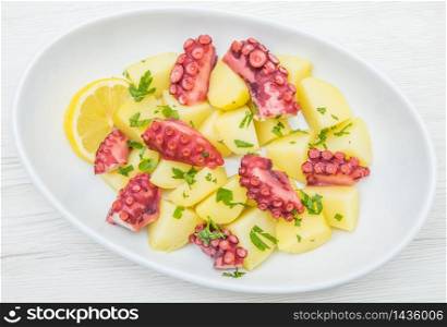 delicious plate of octopus salad with potatoes