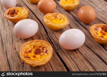 delicious portuguese egg tart on wood background