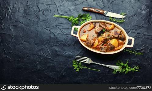Delicious ragout with beef and mushrooms. Meat sauce with veal. Copy space. Stew with veal and mushrooms,space for text